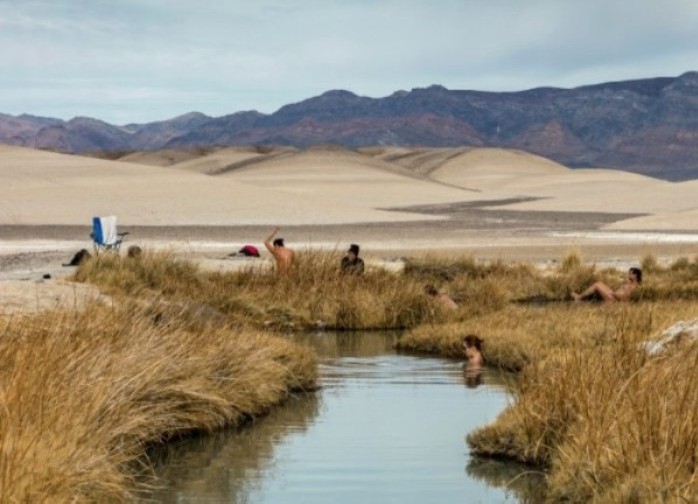 Bathers at Tecopa Natural Hot Springs, Tecopa, CA, 2016 © Kim Stringfellow 2018